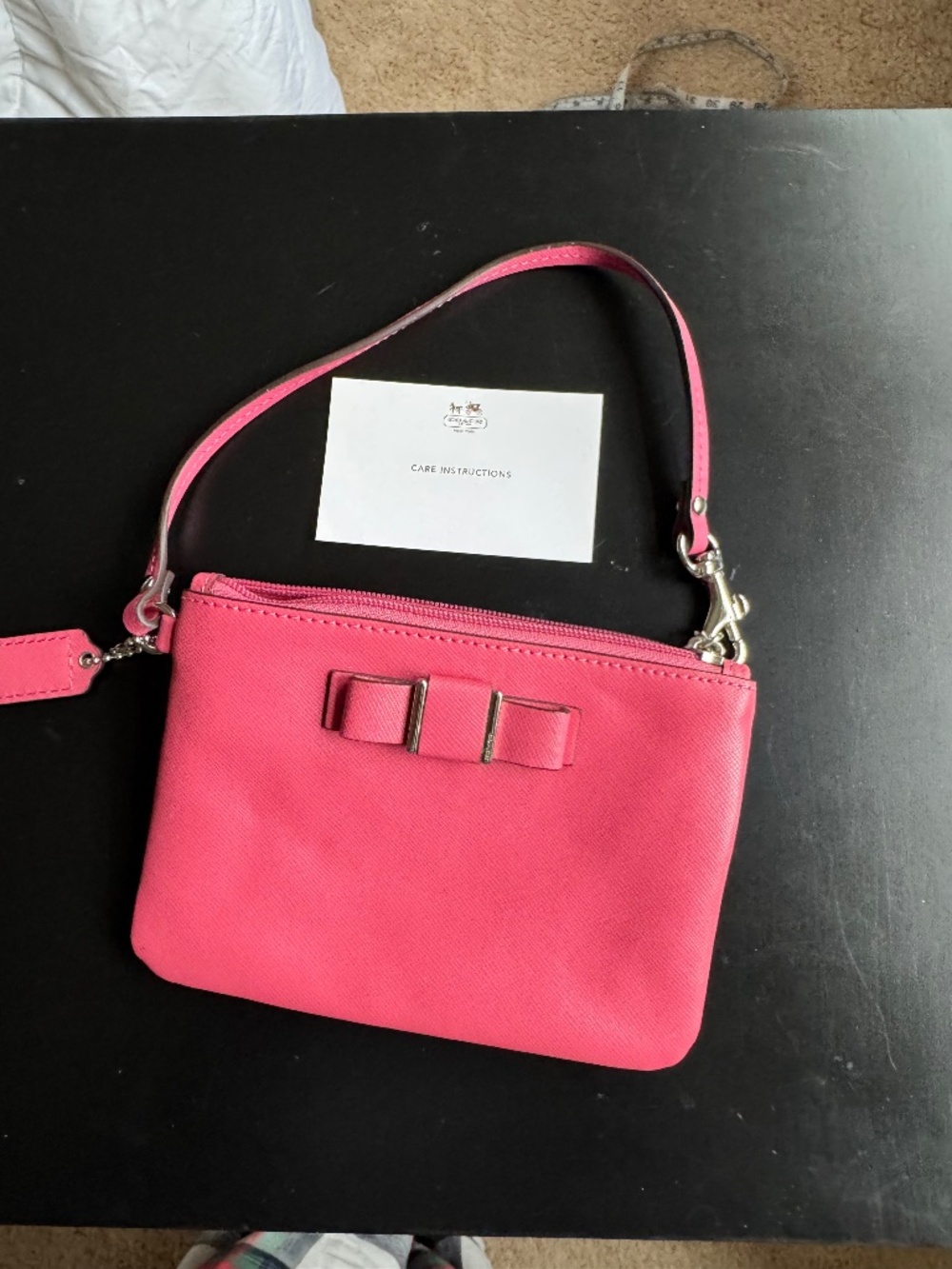 Coach Saffiano bow wristlet